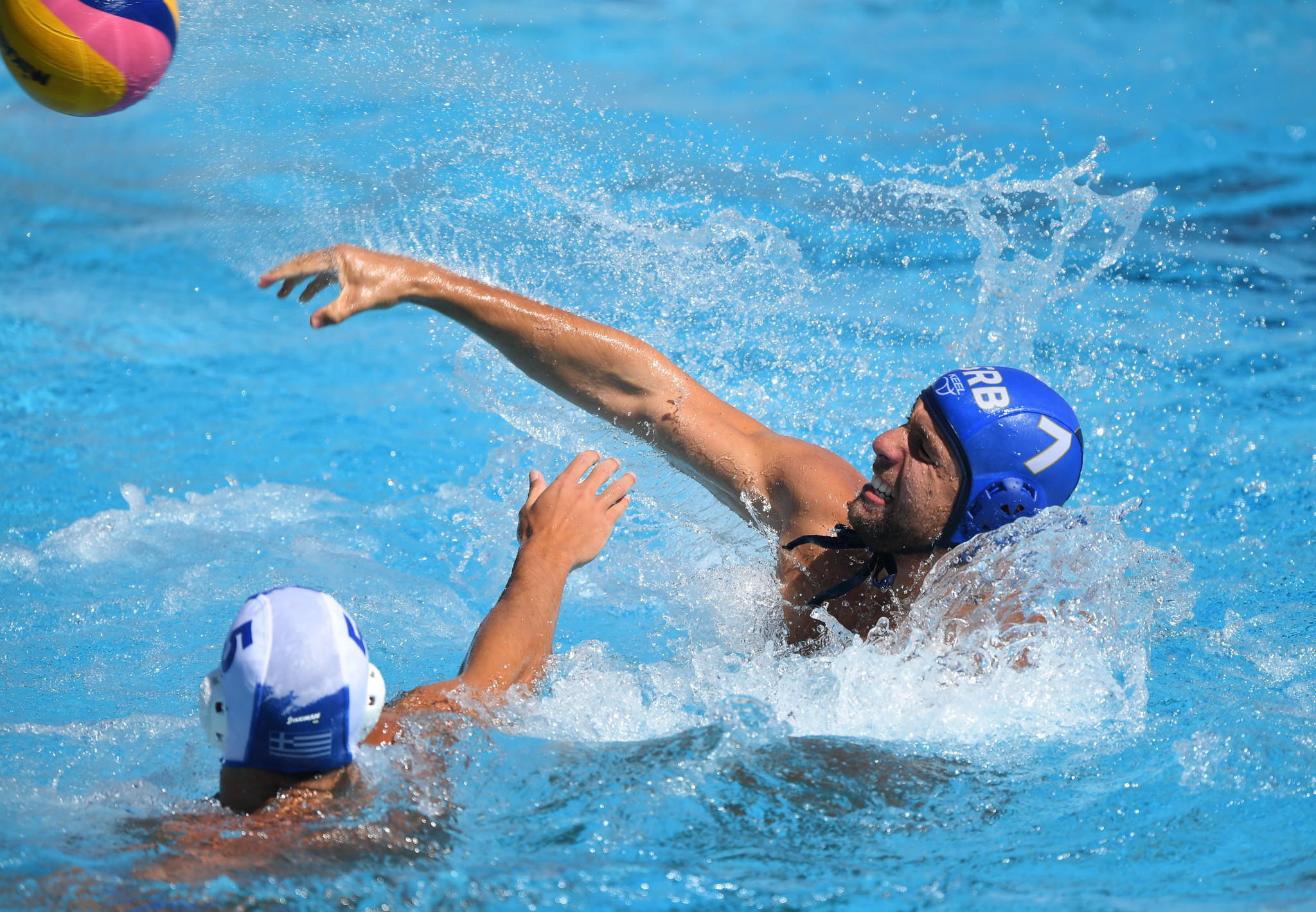 Australia beat reigning world champions to reach semi-finals at Men's Water Polo World Cup