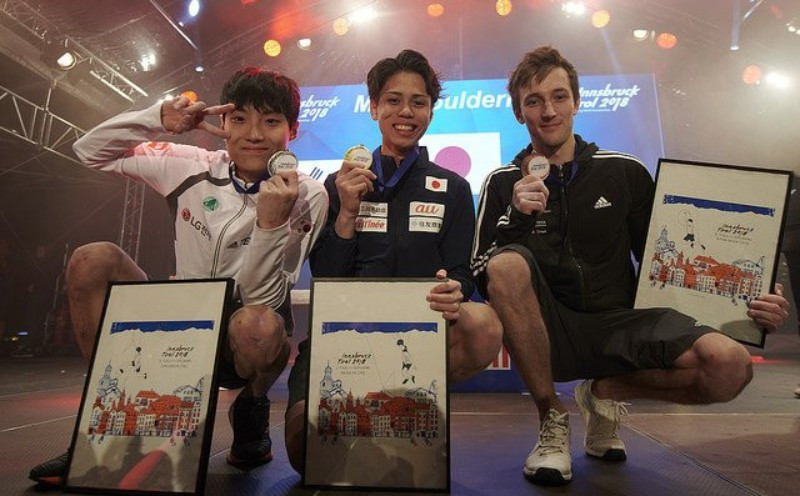 Kai Harada, centre, will feature in tomorrow's combined finals ©IFSC