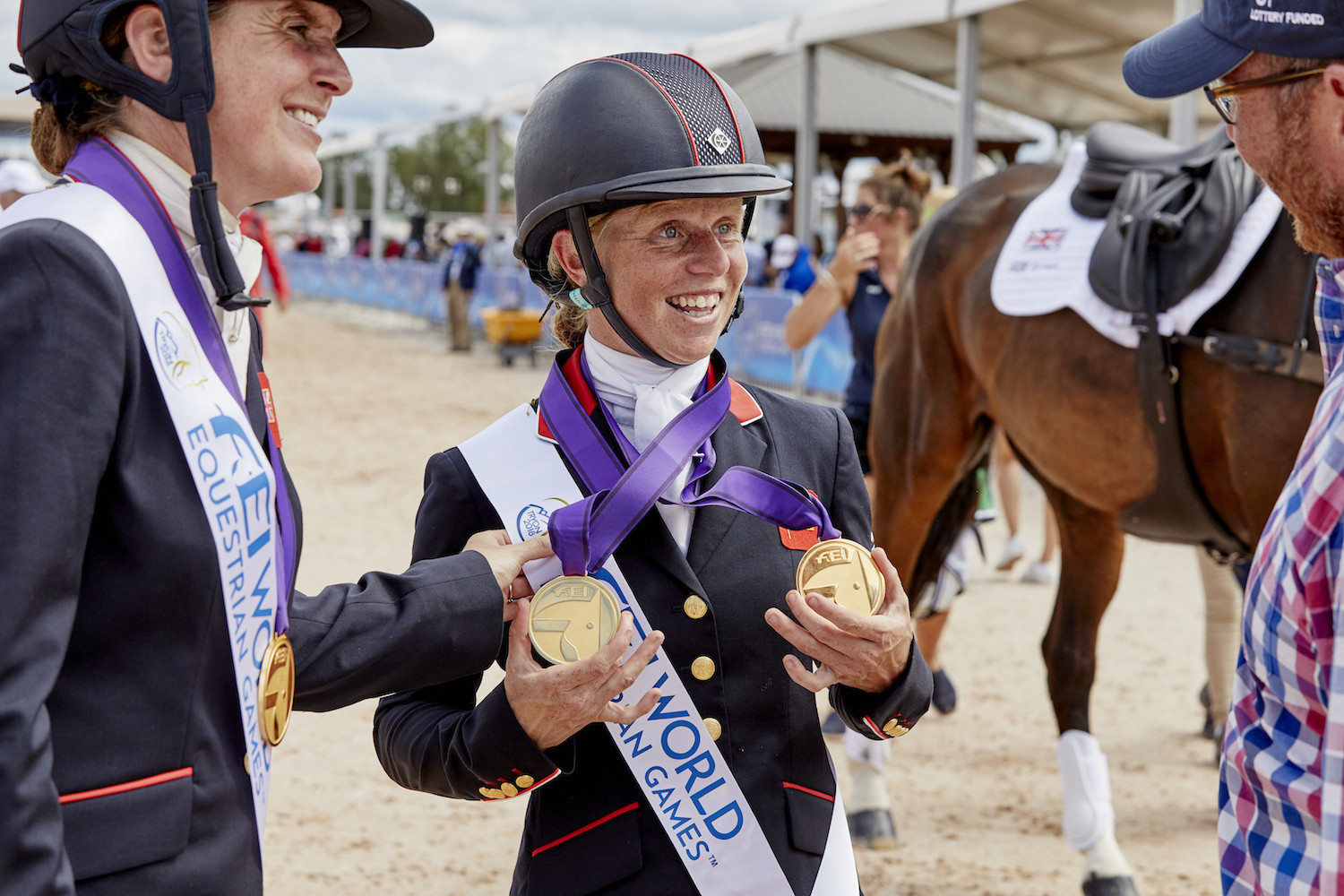 Britain celebrate team and individual eventing titles at World Equestrian Games 