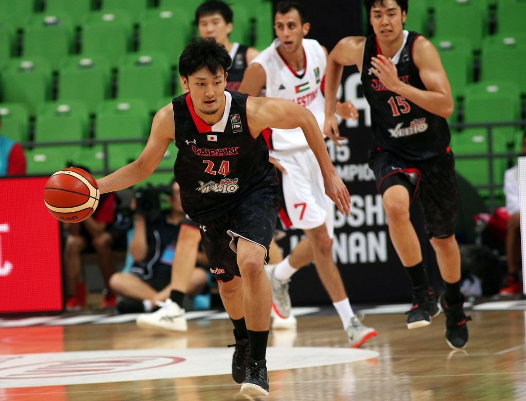 Japan claimed a crucial win over Palestine to keep their quarter-finals hopes on track