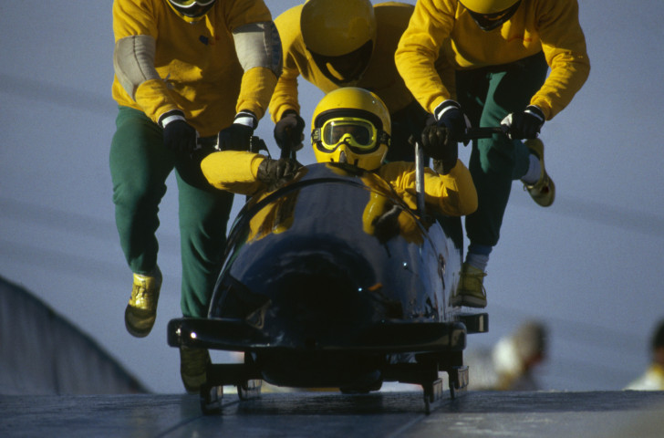 Dudley Stokes Jr in command of the Jamaican four man bobsleigh team at the 1988 Winter Olympic Games in Calgary which inspired the hit Hollywood movie Cool Runnings ©Getty Images  