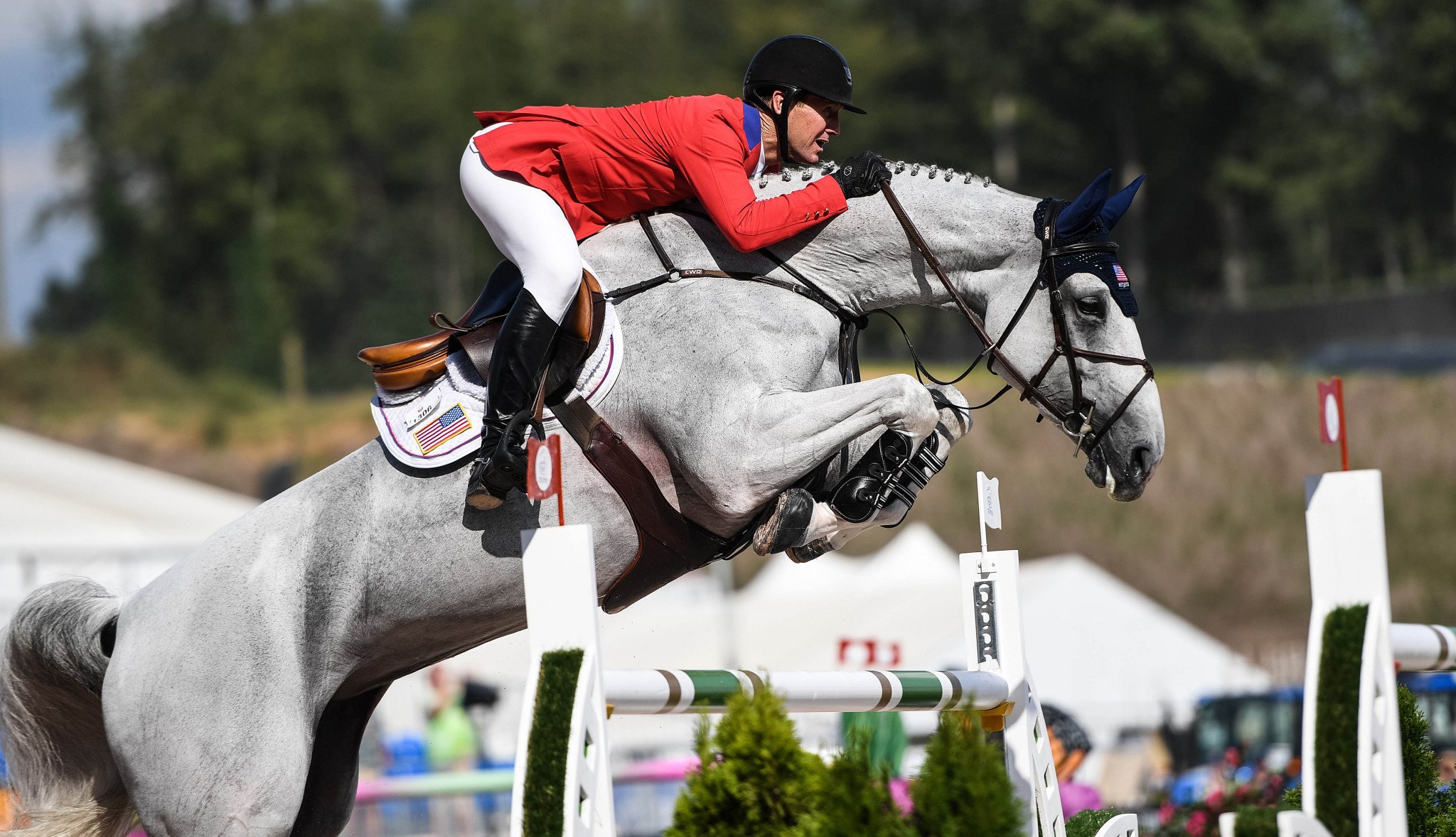 US hosts move up to challenge Switzerland in team jumping at FEI World Equestrian Games