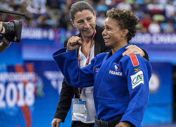 France's world number one Amandine Buchard leaves the mat in tears after securing the World Championships bronze medal ©IJF