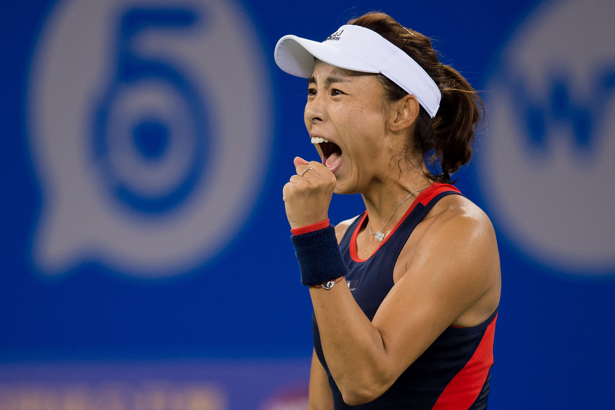 Wang Qiang of China celebrates beating Australian Daria Gavrilova at the Wuhan Open ©Getty Images