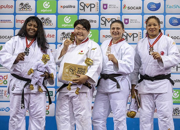 The women's heavyweight medallists smile on the final day of individual competition ©IJF