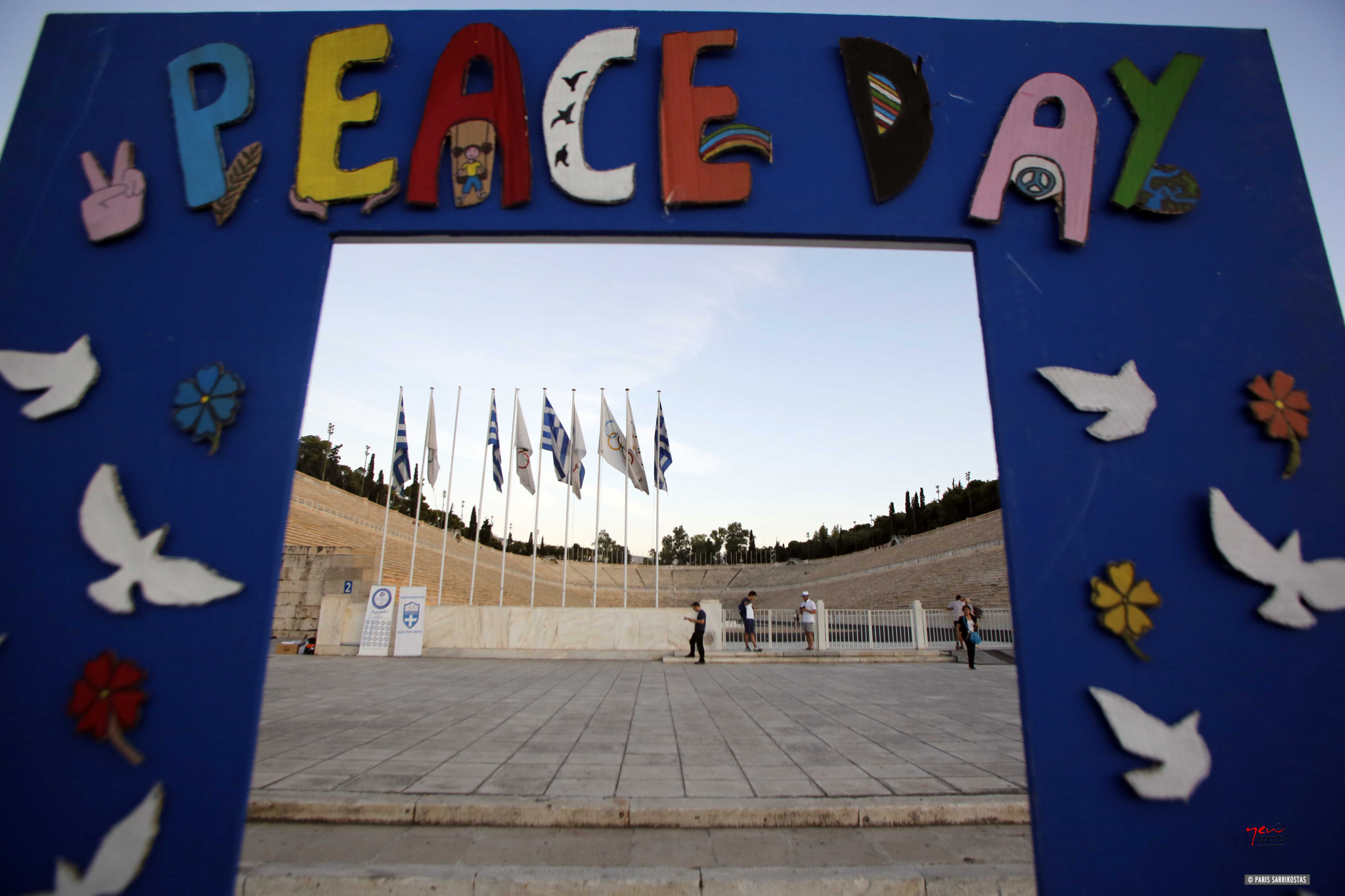 Painting for Peace was one of the activities involving Olympians and schoolchildren at the Panathenaic Stadium in Athens to mark the International Day of Peace ©HOC