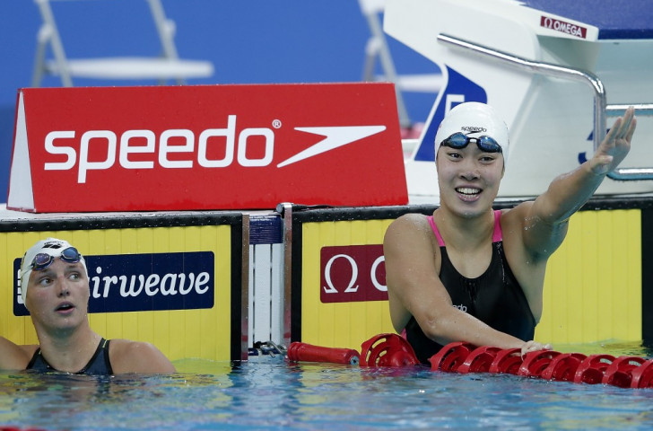 China's Shen Duo snatched the women's 200m freestyle title in 1:56.47