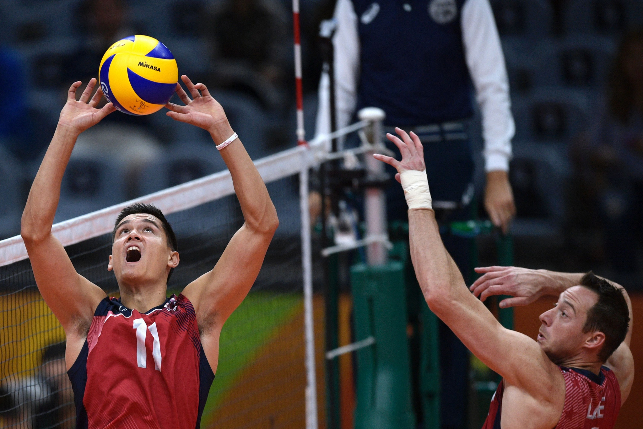 Volleyball Olympic champion David Lee, right, will make his beach debut in the qualification round ©Getty Images