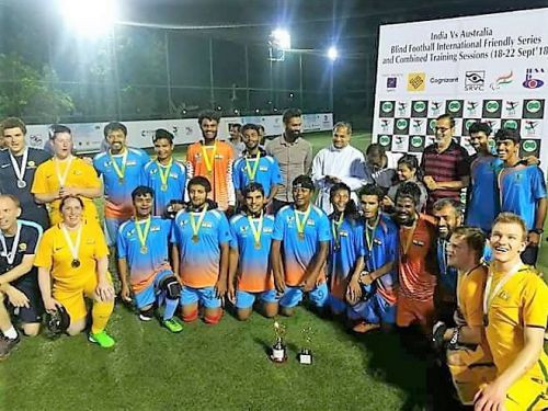 The Australian and Indian blind football teams after their games in Kochi ©IBSA