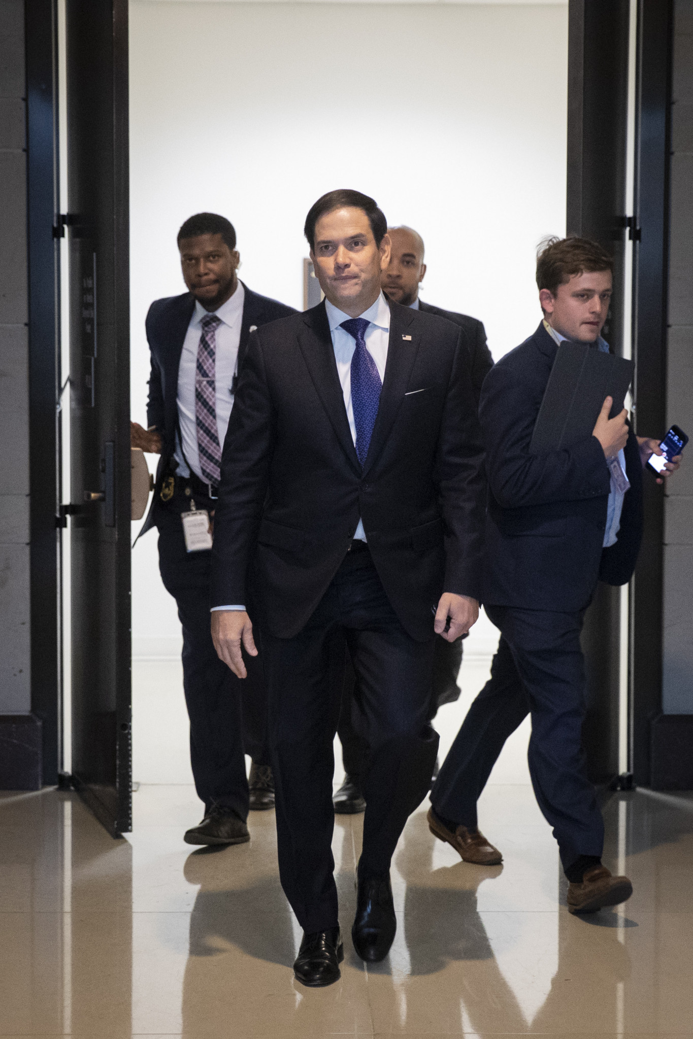 The chairman of the Commission, Marco Rubio, centre, has said Beijing should not host the 2022 Winter Olympic and Paralympic Games ©Getty Images