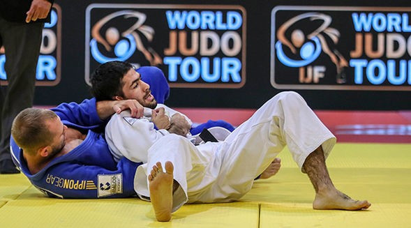 Aram Grigoryan beat Mikhail Puliaev in an all-Russian men's under-66kg final ©IJF