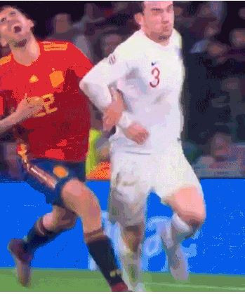 Spain's Dani Ceballos suffers a mysterious pain after not connecting with the elbow of England's Ben Chilwell in Seville on Monday night - leading to plenty of criticism on social media ©Twitter