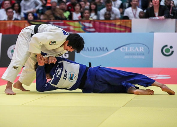 Japan's Ryoko Takeda became junior world champion in addition to her cadet title ©IJF