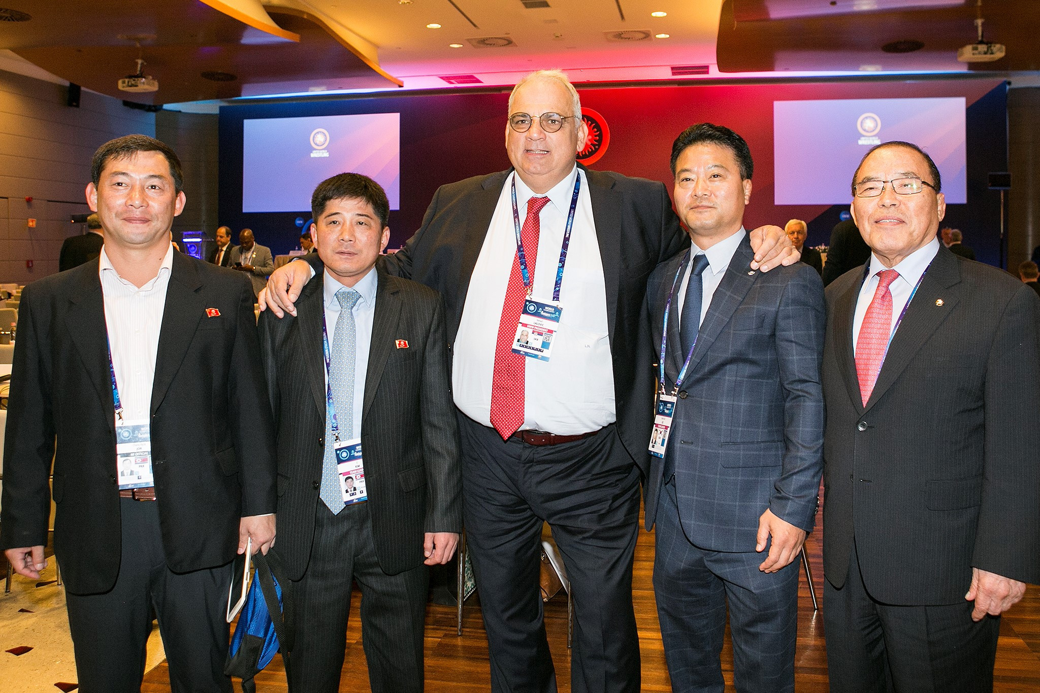During the Congress UWW President Nenad Lalovic, centre, oversaw a handshake between representatives from North and South Korea ©UWW