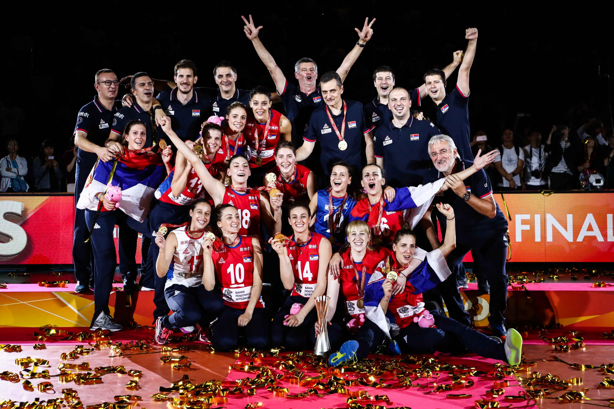 Serbia celebrate winning the FIVB Women's Volleyball World Championships for the first time in the country's history ©FIVB