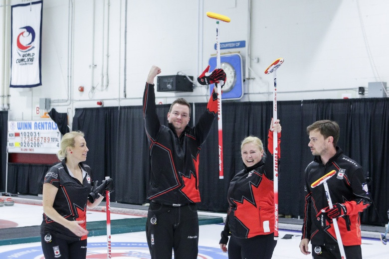 Canada celebrate winning the World Mixed Curling Championships, won on home ground at the Kelowna Curling Club ©WCF/Jeffrey Au 