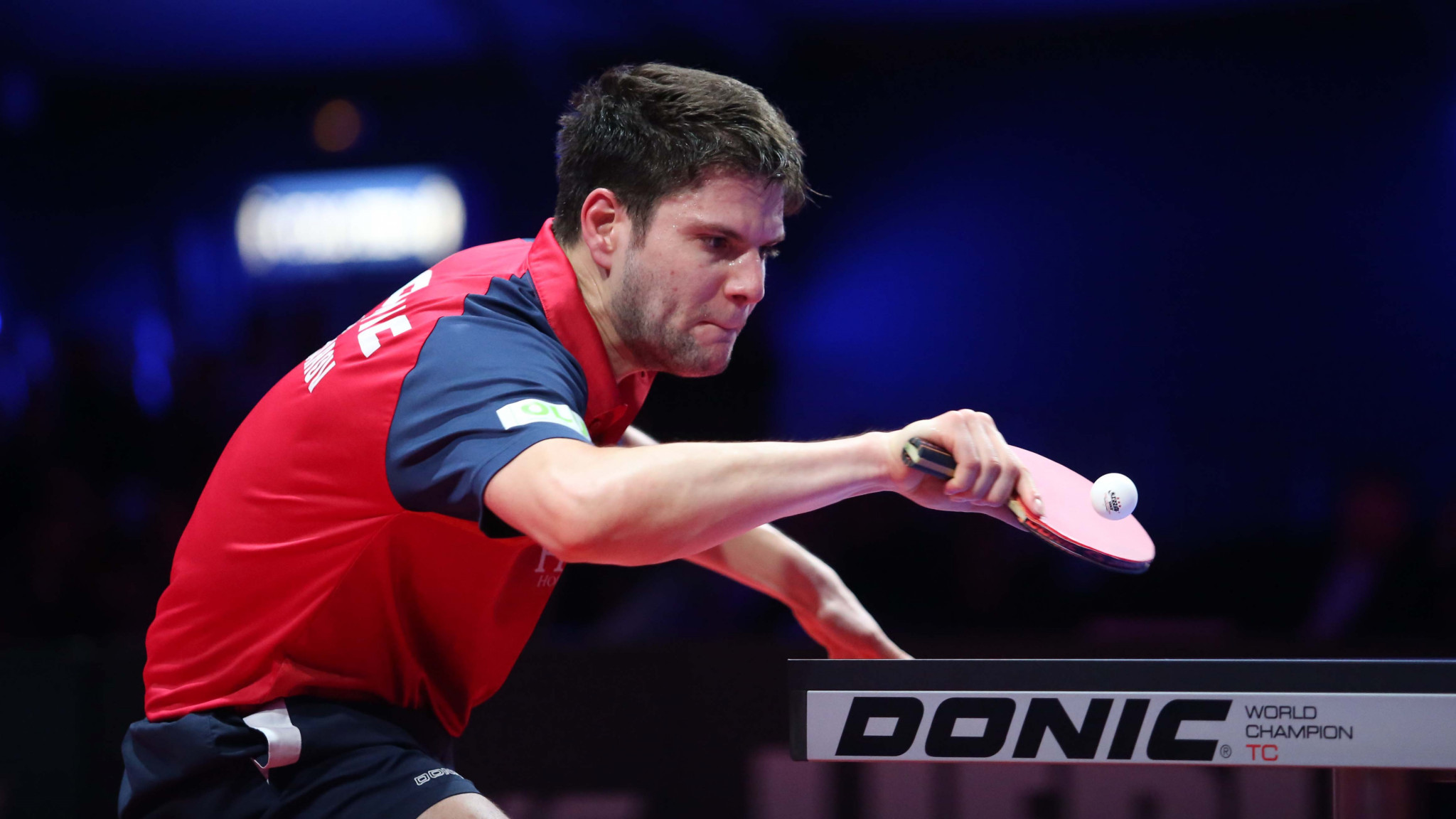 Dimitrij Ovtcharov lost to compatriot Timo Boll as his title defence ended ©ITTF