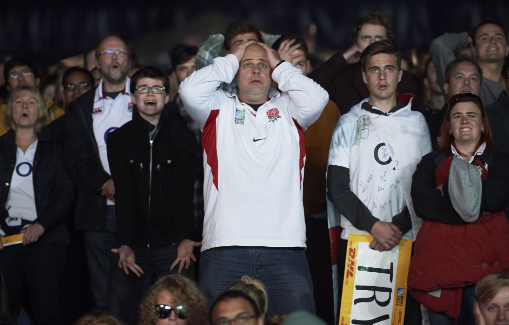 There were stunned scenes around the country as the host nation crashed out ©AFP/Getty Images