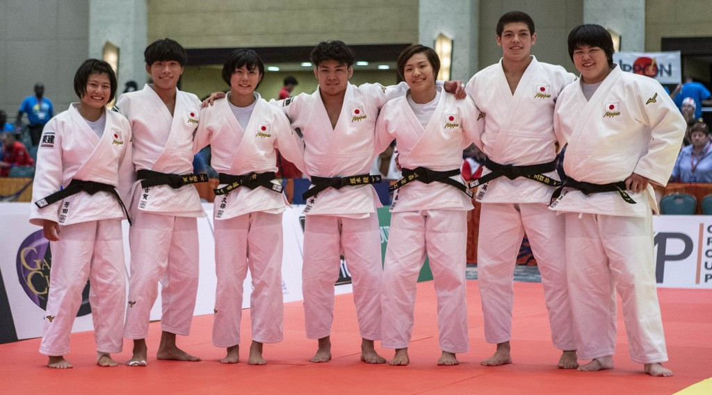 Japan celebrate a dominant final performance for the gold medal ©IJF