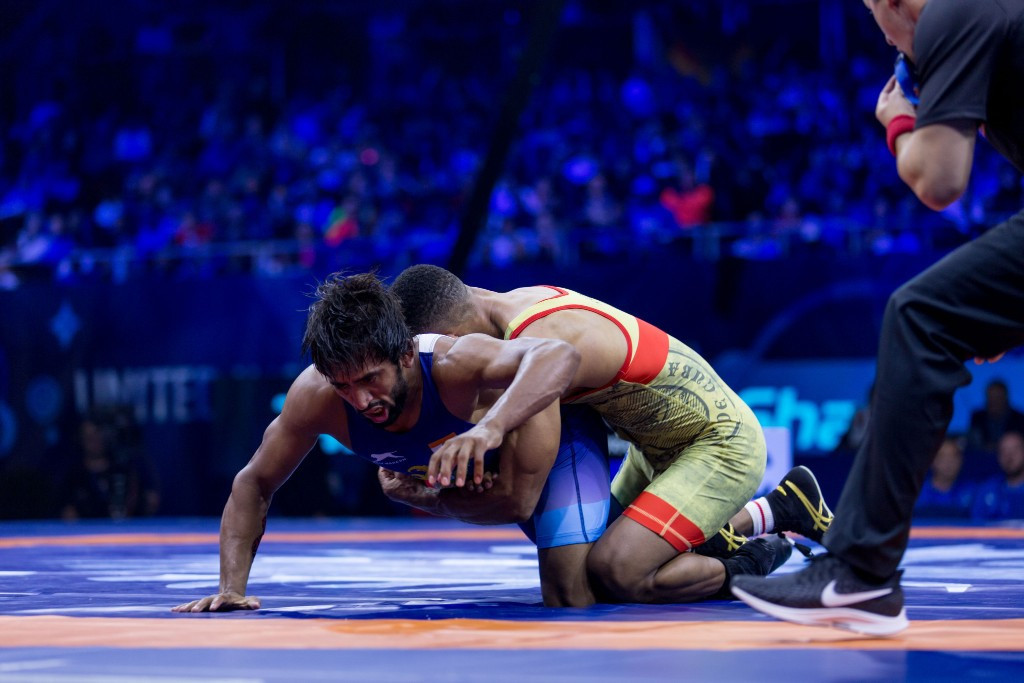 India's Bajrang Bajrang, in blue, became the first wrestler from his country to make a world freestyle final since 2013 by winning his 65kg semi-final ©UWW