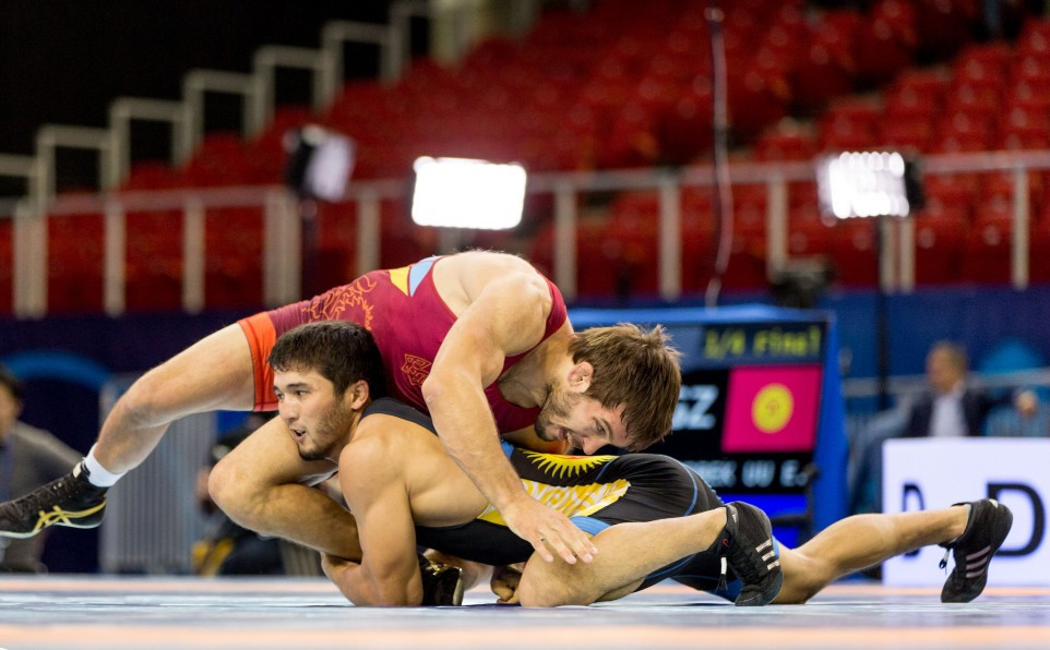 Ukraine's Andriy Kvyatkovskyy, top, the number one seed in the 70kg class, lost in the semi-finals ©UWW