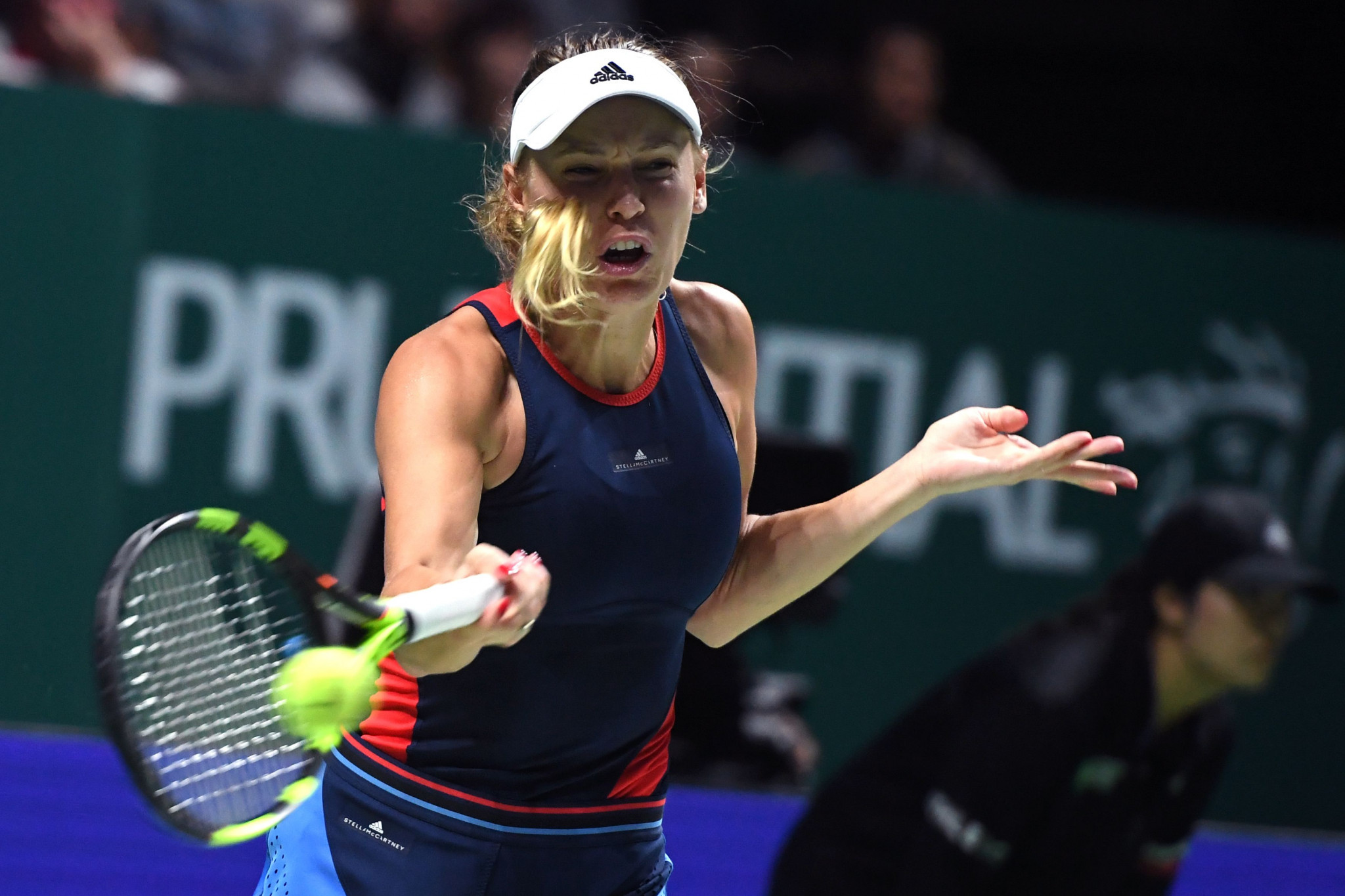 Defending champion Wozniacki keeps WTA Finals hopes alive with win over Kvitová