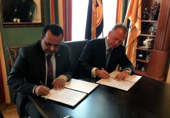Signing at IJF HQ confirms Qatar as hosts of 2023 World Judo Championships 