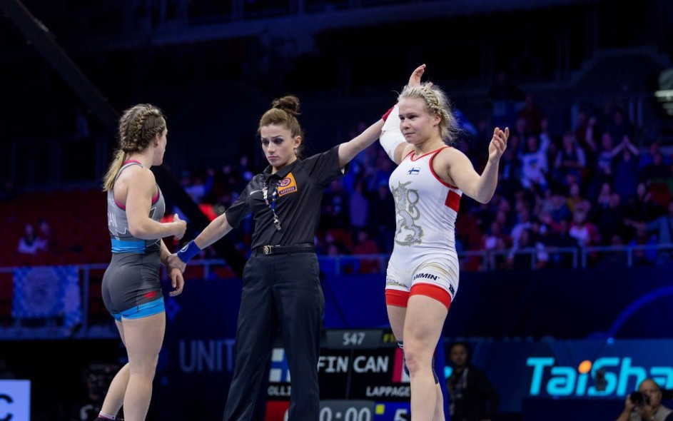 In the first final of the night at 65kg there was confusion as initially both Petra Olli, right, and Danielle Lappage, left, thought they had won ©UWW