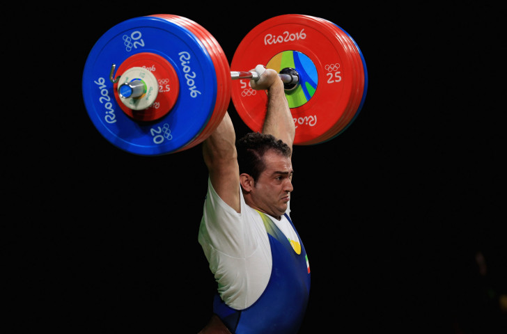 Sohrab Moradi of Iran en-route to gold in the men's 94 kilograms weightlifting at the Rio 2016 Olympics - the IWF believes it has done enough to combat doping to retain its Olympic status ©Getty Images  