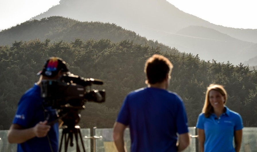 Athletes being interviewed ahead of tomorrow's ITU World Cup race on what looks like a challenging coastal course at Tongyeong in South Korea ©ITU
