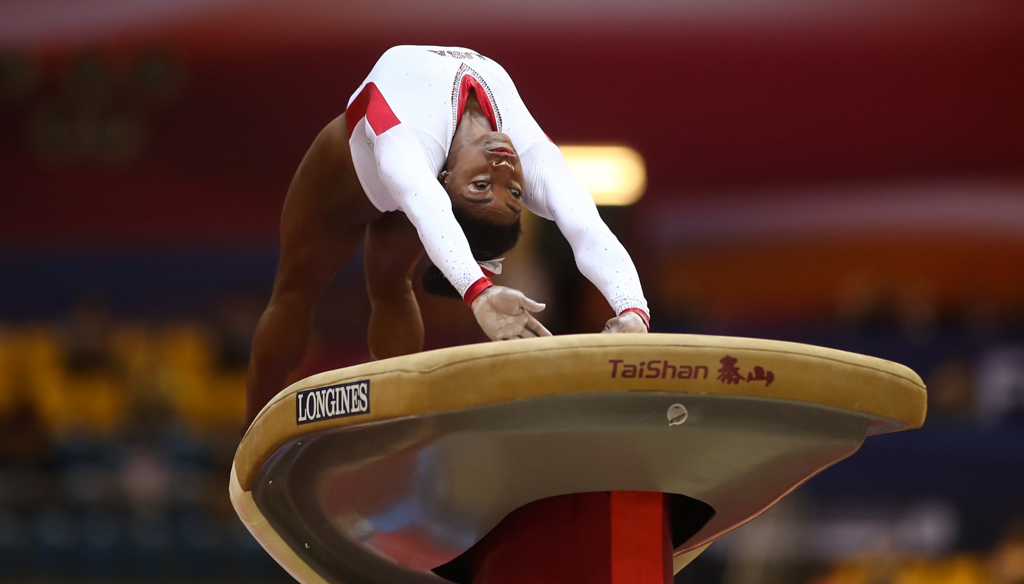 Simone Biles earned gold on the vault and silver on the uneven bars ©Getty Images