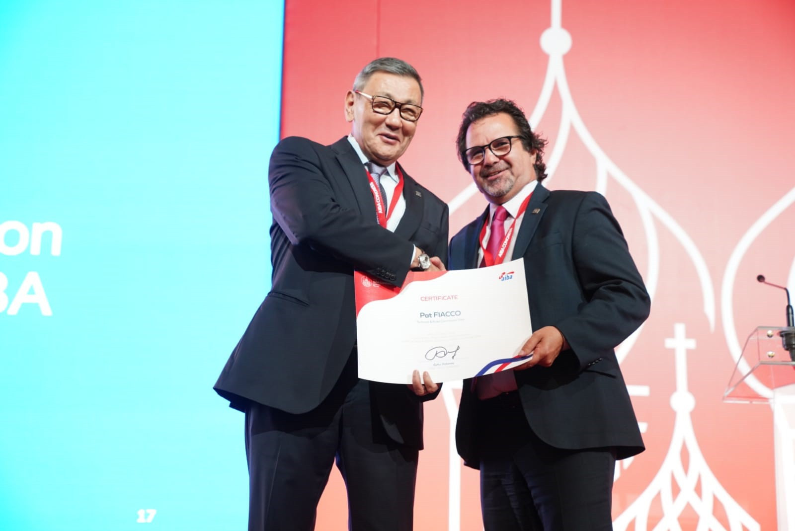AIBA Interim President Gafur Rakhimov handed out certificates to key officials, including Canada's Pat Fiacco ©AIBA
