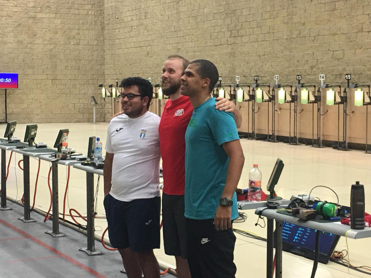 James Hall, centre, took gold for the United States today in the 10m air pistol event at the Championships of the Americas in Mexico ©USA Shooting