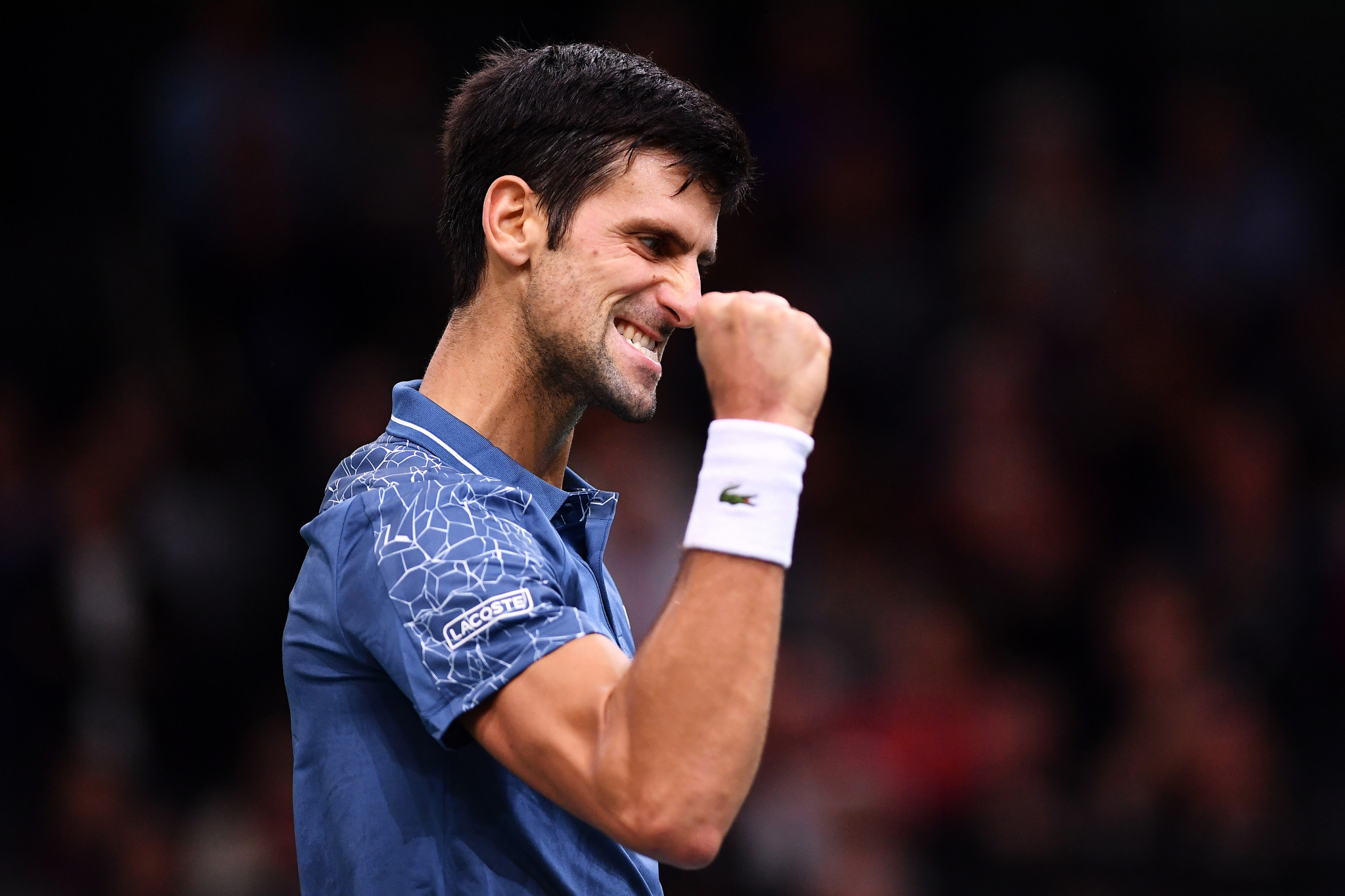 Novak Djokovic celebrates during an epic semi-final win over Roger Federer at the ATP Paris Masters ©Getty Images  