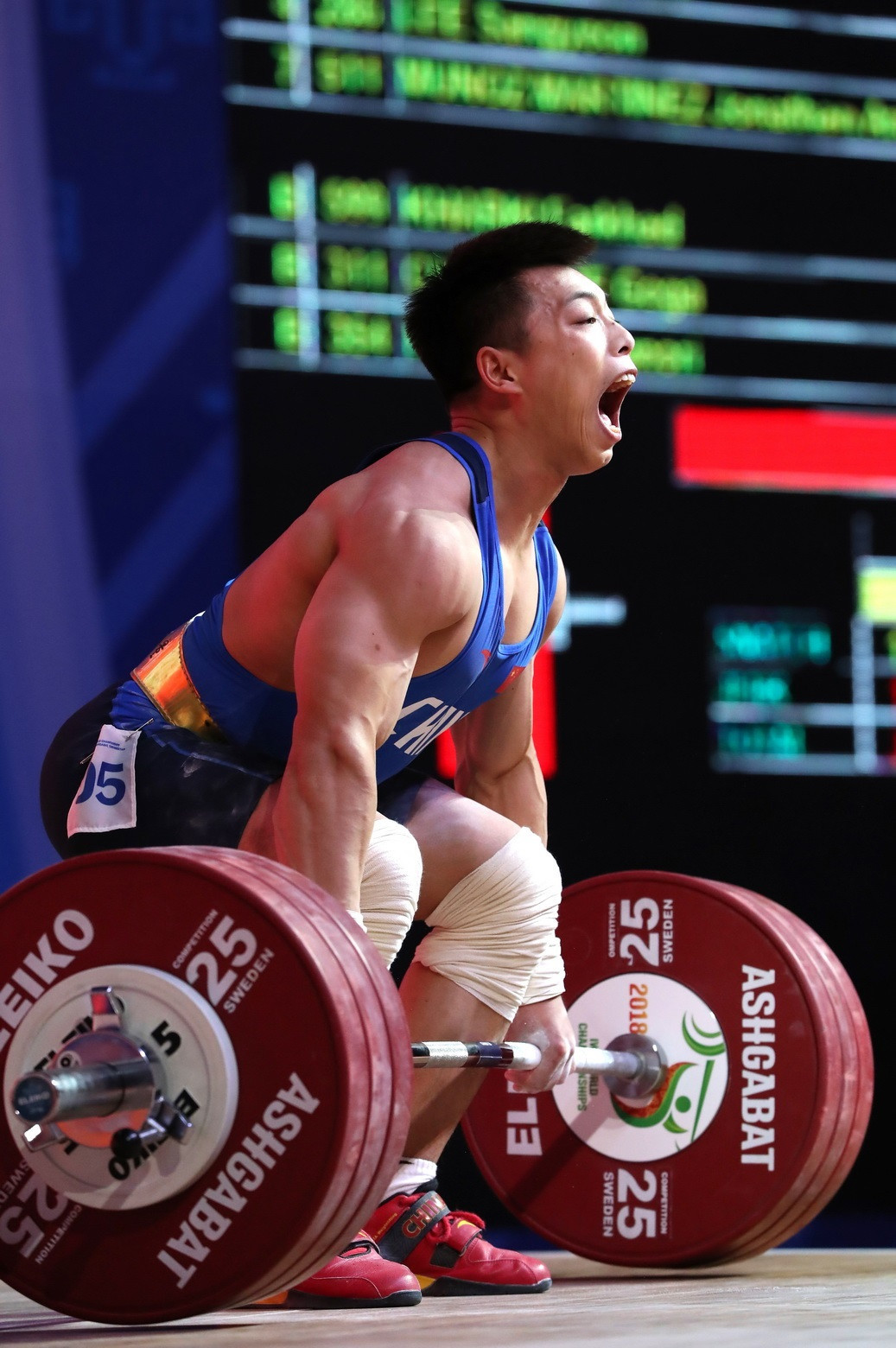 China's Chen Lijun broke the world standard total to top the men's 67kg podium ©IWF