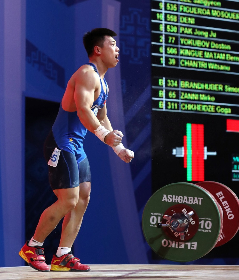 There was also overall success for China today in the men’s 67kg category as Chen Lijun triumphed with a world standard-breaking total ©IWF