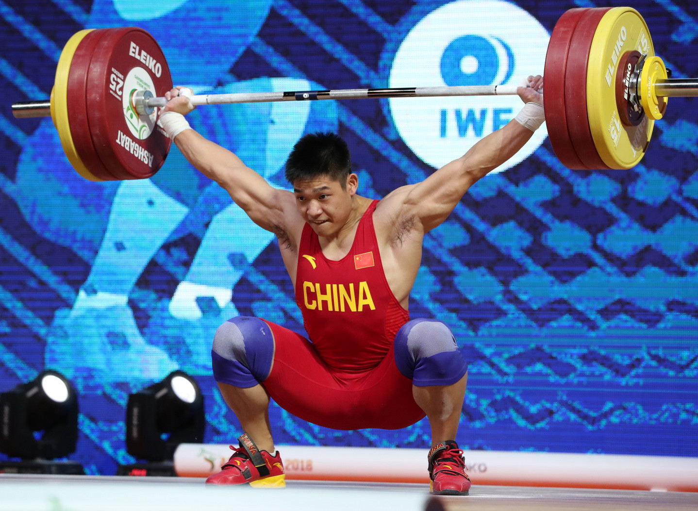 China's Li Dayin finished third overall with a junior world standard-breaking 372kg ©IWF