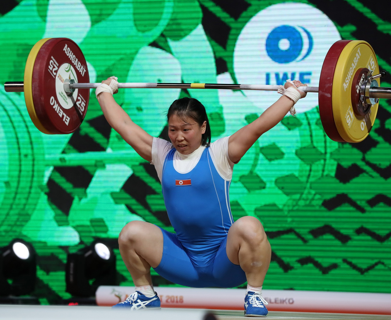 North Korea's Rim Un Sim clinched the overall silver medal ahead of Thailand's Rattanawan Wamalun by virtue of the fact that she posted their identical total of 239kg first ©IWF