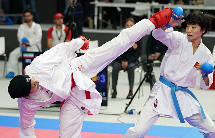 China’s Xiaoyan Yin, right, will take on the Serbian in the final ©WKF