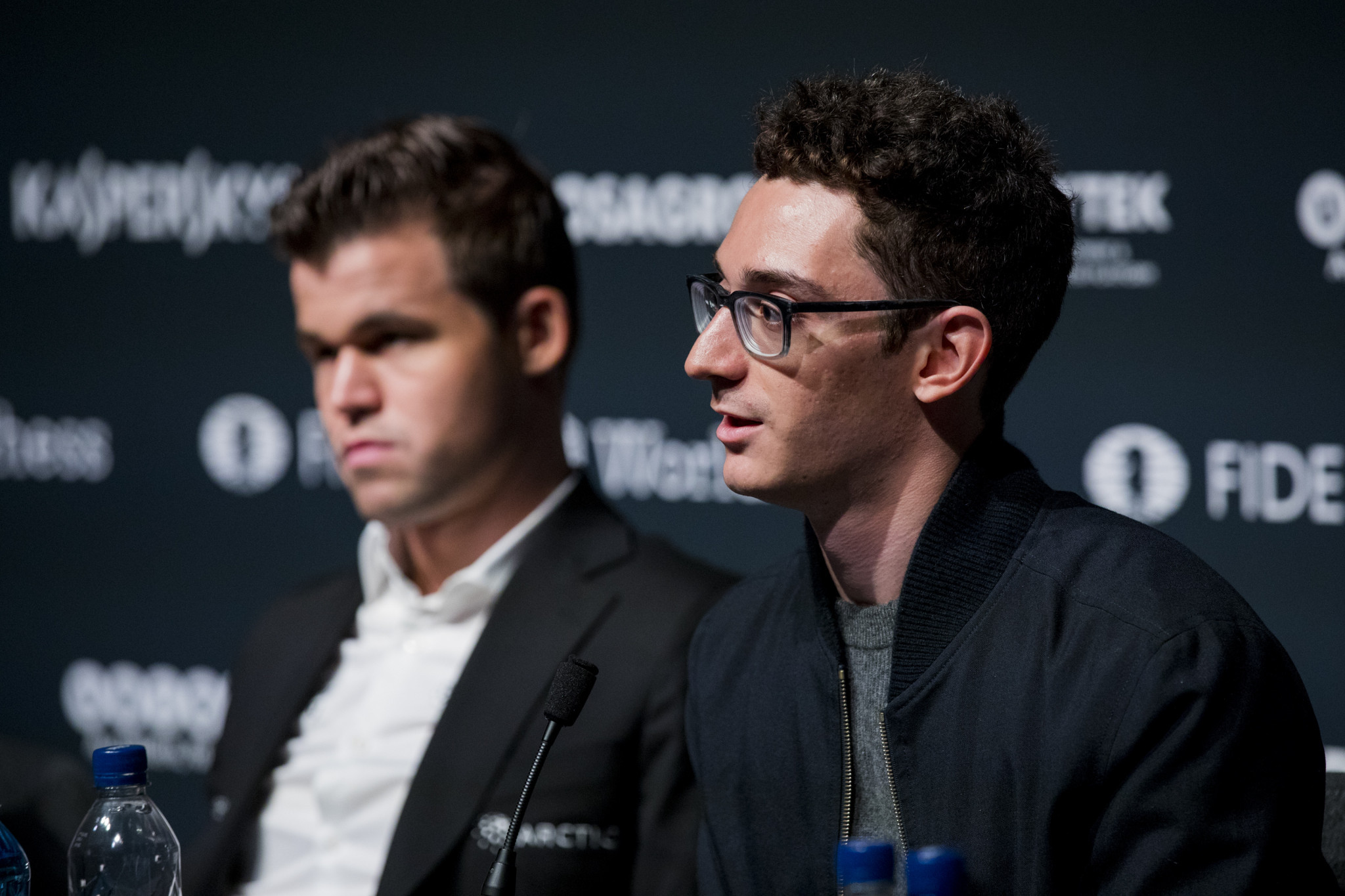 Magnus Carlsen, left, will start the defence of his world chess title against Fabiano Caruana in London tomorrow ©Getty Images  