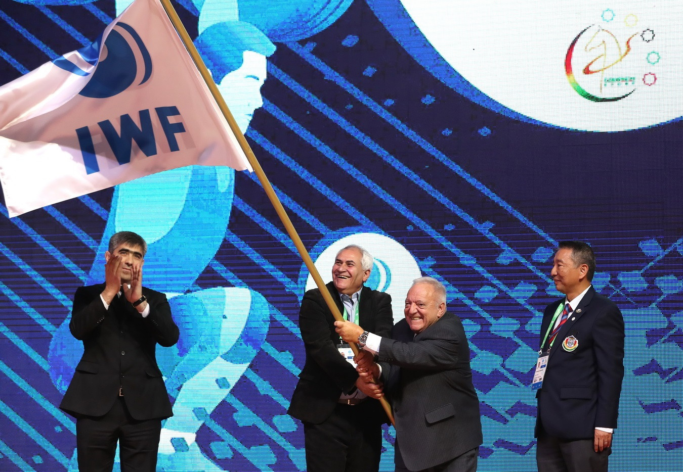IWF President Tamás Aján took part in the flag handover ceremony as attention turns to the 2019 World Championships in Pattaya in Thailand ©IWF