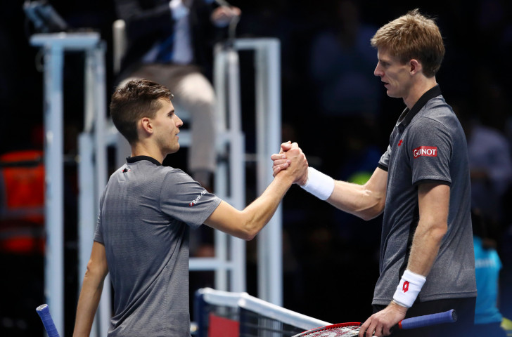 South Africa's Kevin Anderson, right, shakes hands after beating Dominic Thiem of Austria in the opening singles match of the ATP Finals at London's 02 Arena ©Getty Images  