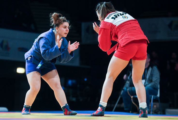 Moldova's Nantalia Budyanu, in red, picked up a bronze in the women's 68kg division ©FIAS