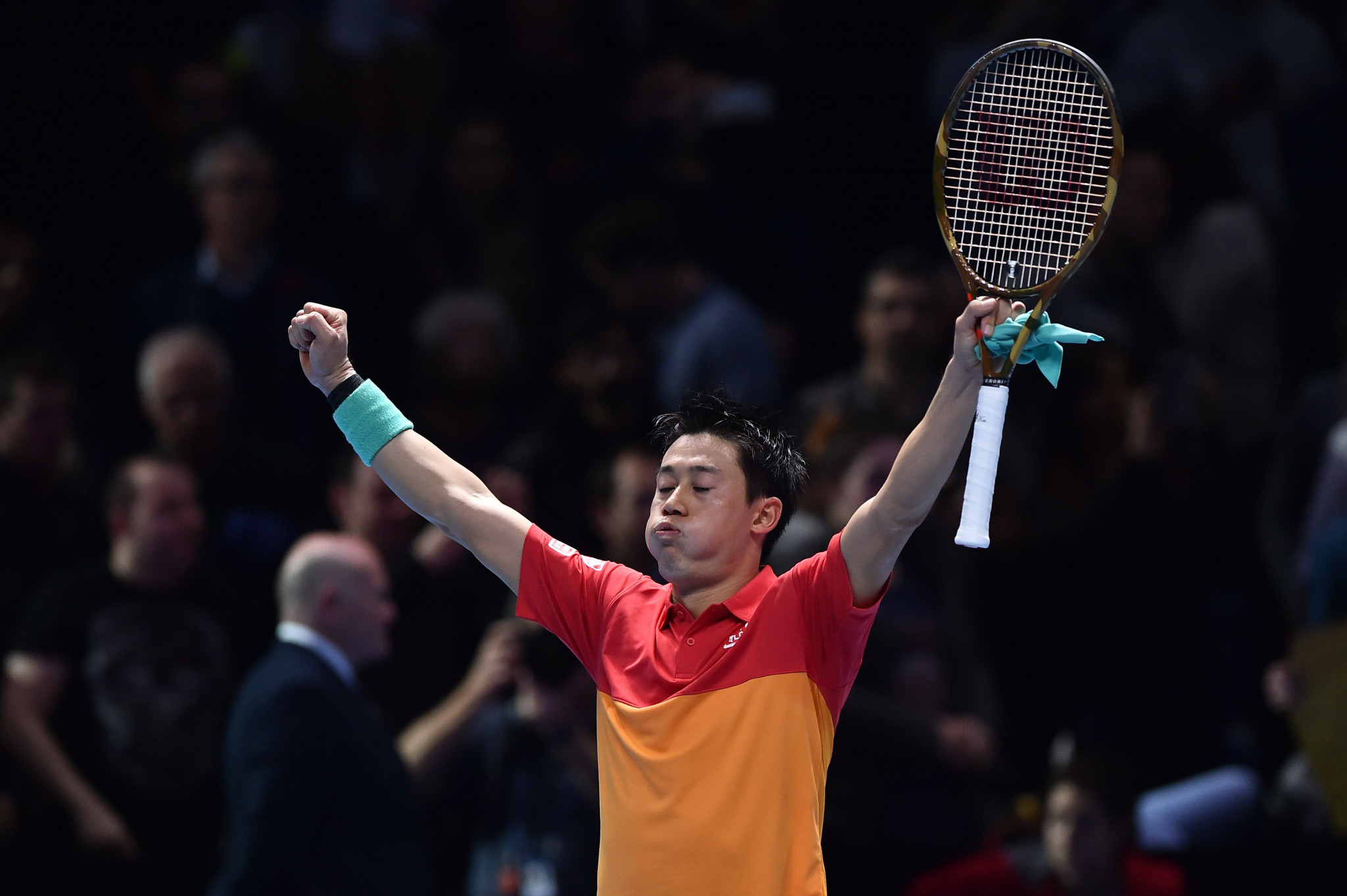 Kei Nishikori celebrates victory over his "idol", Roger Federer, at the ATP Finals in London ©Getty Images  