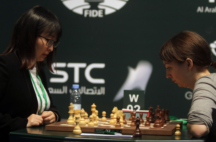 Defending champion Ju Wenjun of China, left, is through to the semi-finals of the Women's World Chess Championships after beating Uzbekistan's Guirukhbegim Tokhirjonova in Russia ©Getty Images  