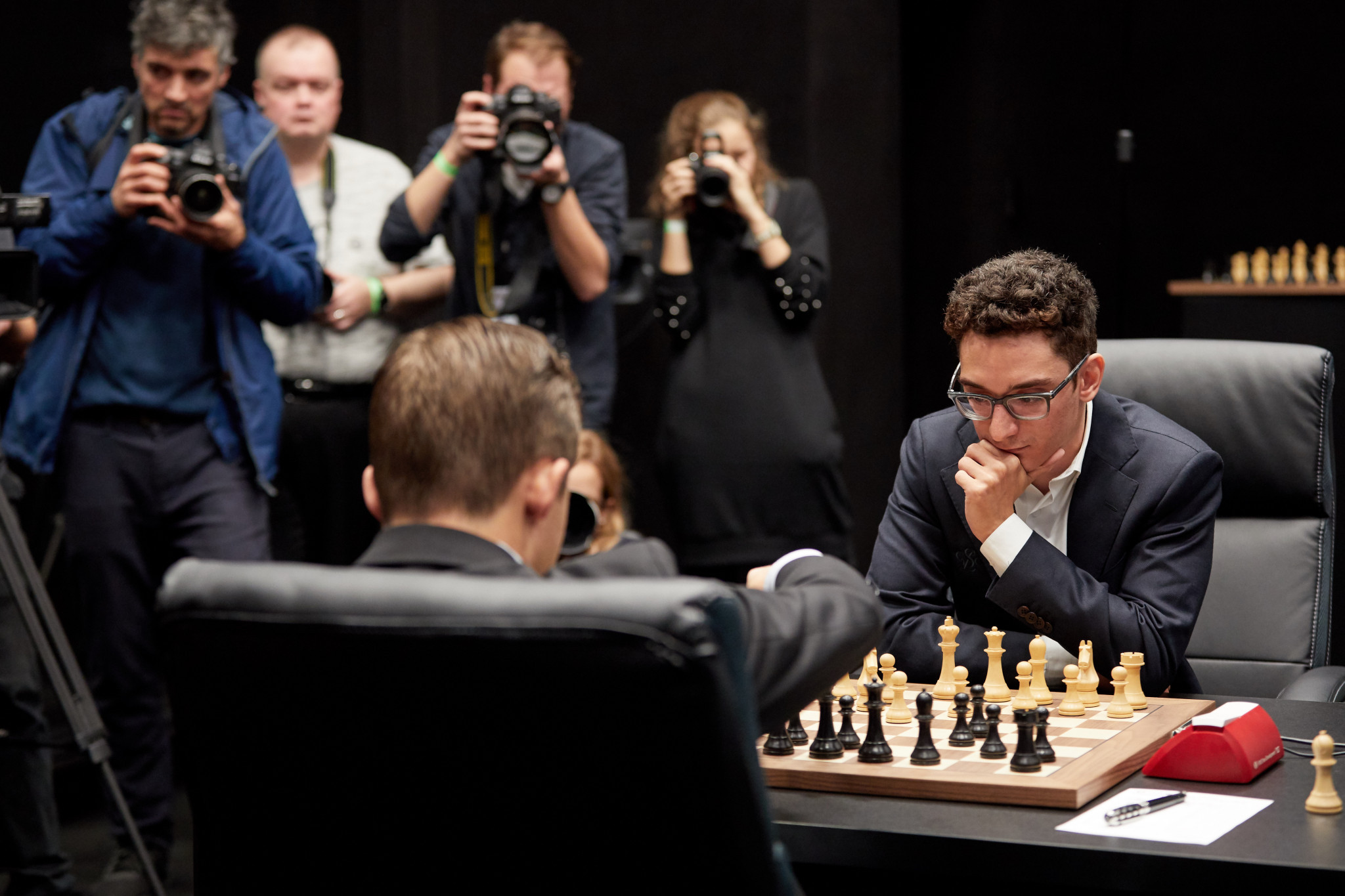 Defending champion Magnus Carlsen, left, and challenger Fabiano Caruana have played out a fifth successive draw in their World Chess Championship at Holborn in central London ©Getty Images  