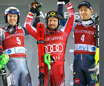 Austria's Marcel Hirscher, centre, celebrates slalom victory at the opening men's World Cup race of the season at Levi, Finland ©FIS 