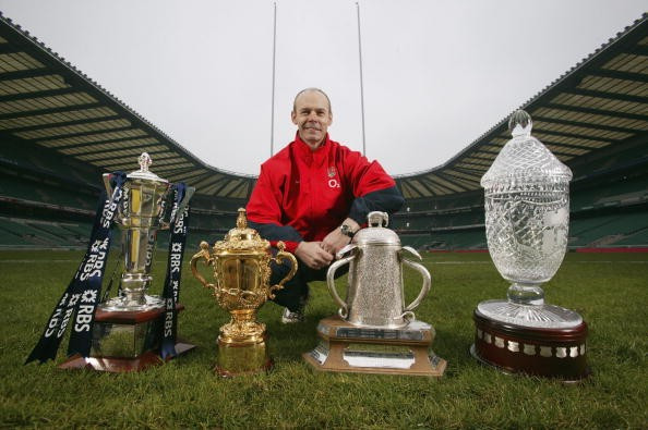 Former England head coach Clive Woodward pictured with some of the baubles - including the World Cup - his team picked up. Erring players were criticised - in private. ©Getty Images