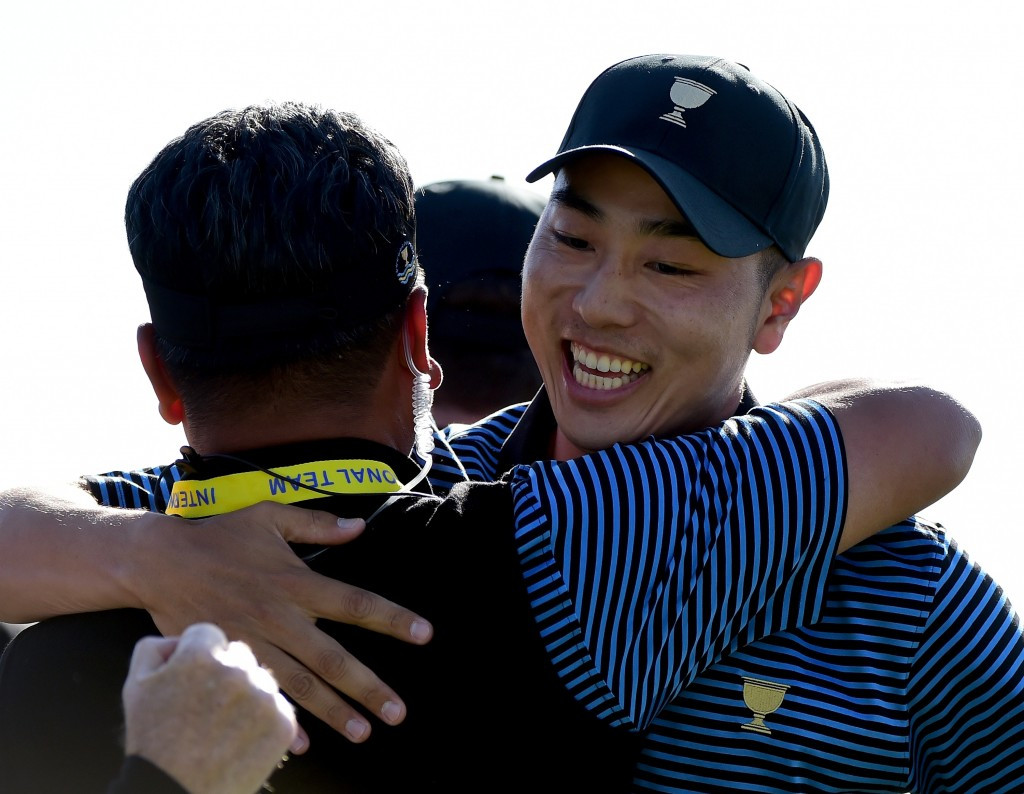 South Korea's Bae Sang-moon celebrates after winning a point with Danny Lee ©Getty Images