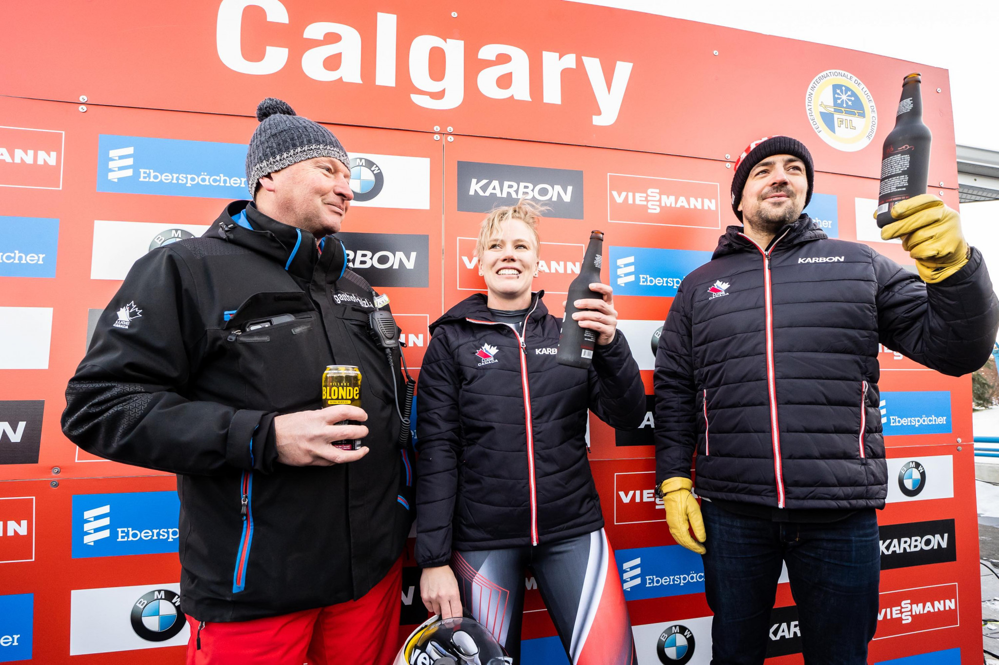Canadian Olympic medalists Alex Gough and Sam Edney toasted their retirement with a Canadian brew at the Luge World Cup event in Calgary ©Canadian Luge Association